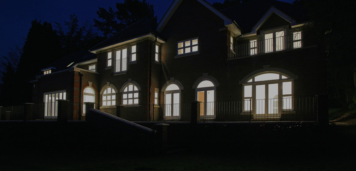 House at night with lights on