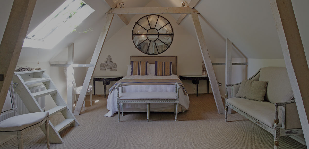 Attic room with bed